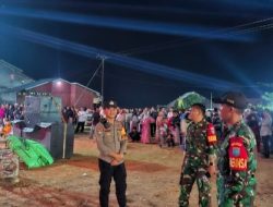 Polsek Ella Hilir Bersama Koramil 13 dan Pemuda Pancasila Amankan Hiburan Rakyat di Desa Popai