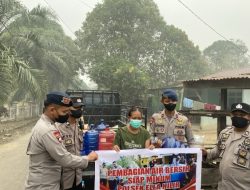 Polsek Ella Hilir Bersama BKO Brimob Salurkan Air Bersih untuk Warga Terdampak Kemarau